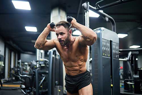 Certified personal trainer working with client in Pembroke Pines home